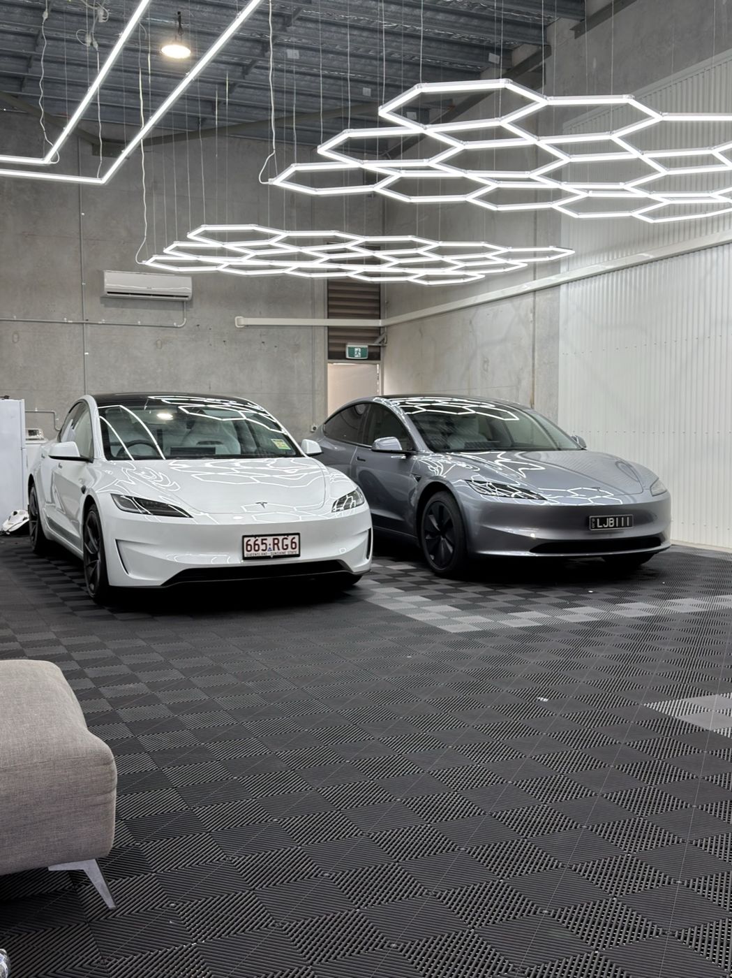 Two Tesla Model 3s after ceramic coating