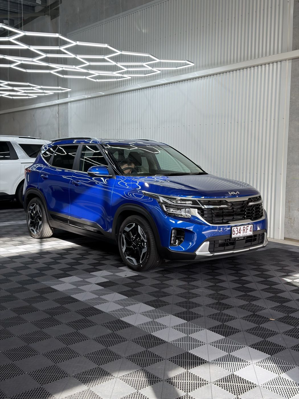 Blue Kia Seltos after ceramic coating